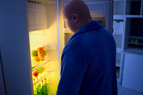 fridge eating food man