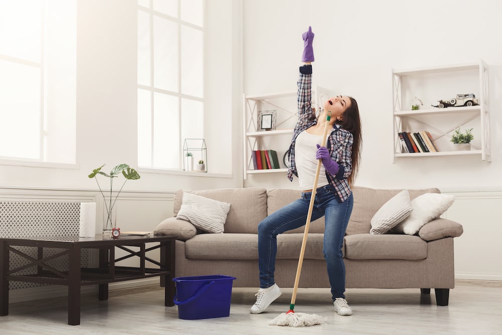 Happy woman cleaning